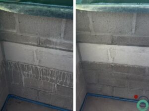 Kalkuitbloei verwijderd van betonnen muur onder vensterbank